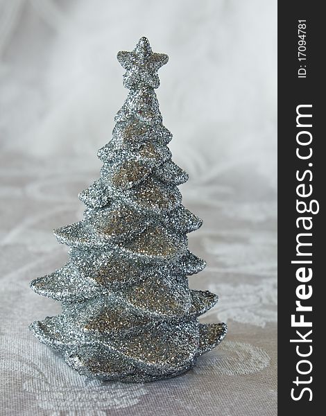 Silver glitter Christmas Tree on a white background