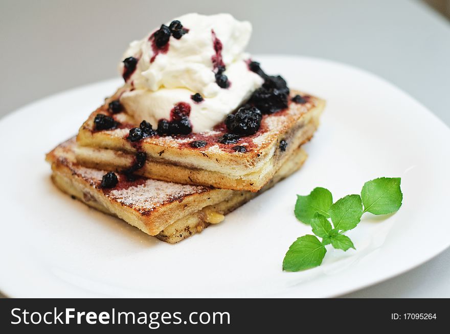 Banana and blueberries sandwich on a plate