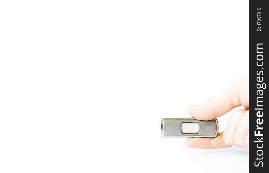 Flash memory stick holded in a hand isolated on white