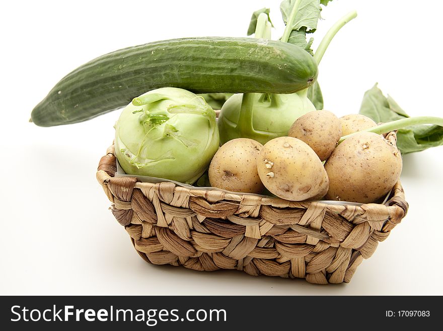 Kohlrabi with potato in the basket. Kohlrabi with potato in the basket