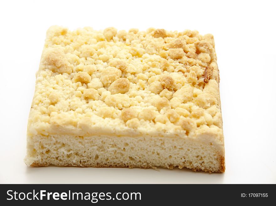 Cake with yeast dough onto white background