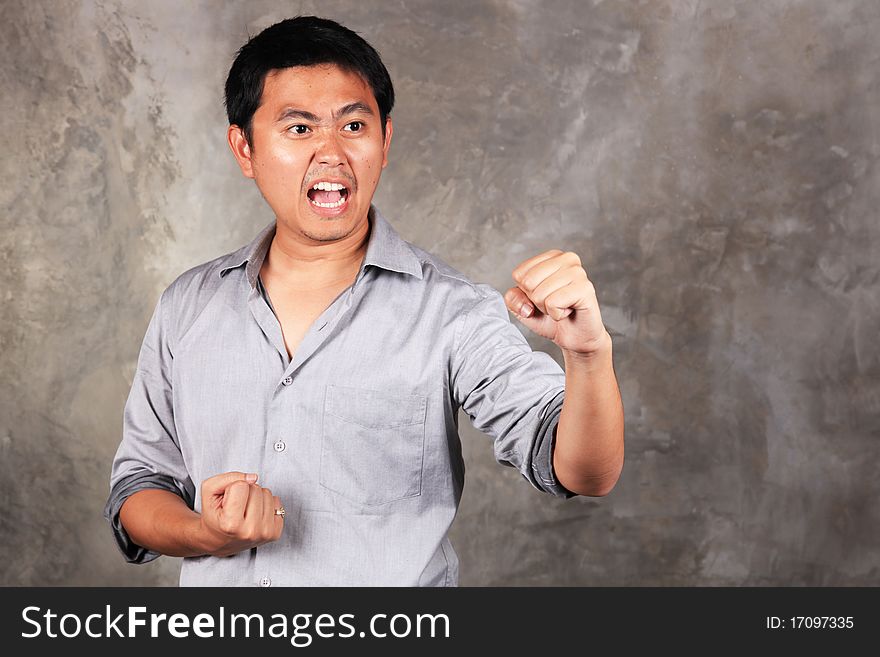 A man guarding prepare to fight.