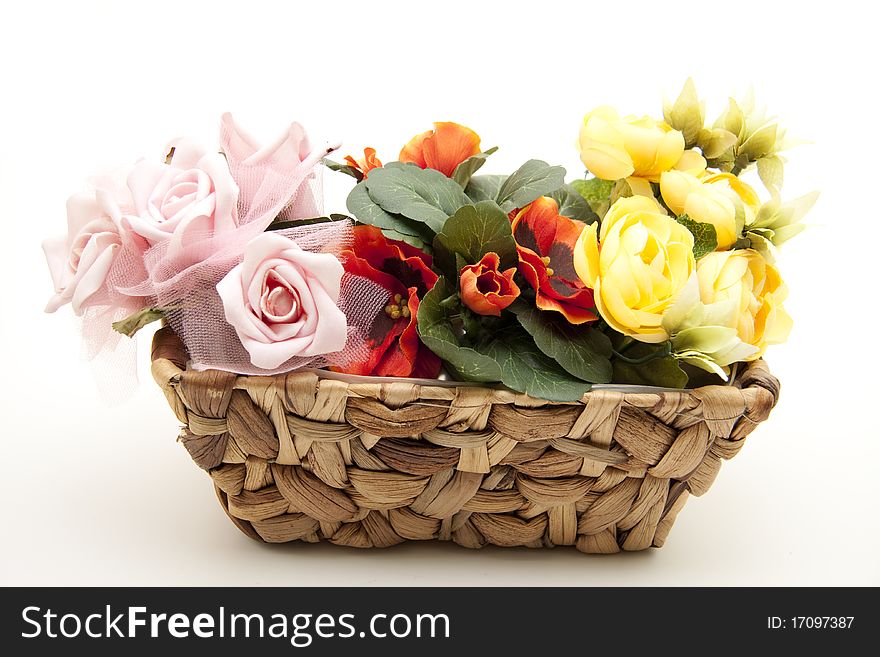 Bunch of roses in the woven basket