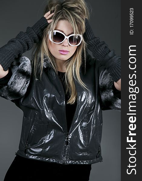 Woman With Sunglasses And Leather Jacket