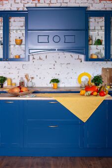 Modern Blue Kitchen Interior In Loft Style With Furniture. Stylish Scandinavian Cuisine In Decor. Wooden Kitchen In Rustic Style. Royalty Free Stock Photos