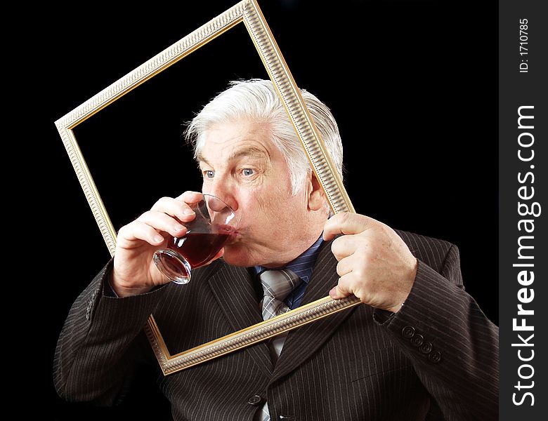 Businessman taking a quick drink breaking the frame. Businessman taking a quick drink breaking the frame