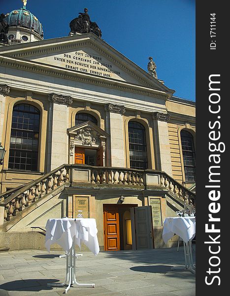 Dining tables in the gendarmenmarkt a popular tourist destination in Berlin.