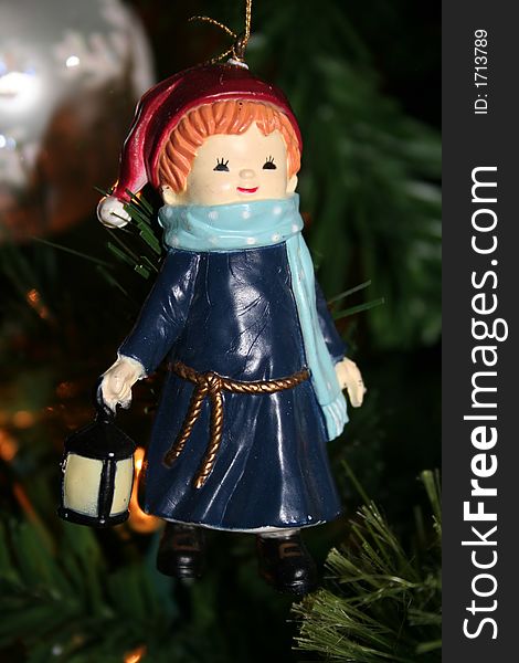 A cute little girl caroler Christmas ornament. A cute little girl caroler Christmas ornament.