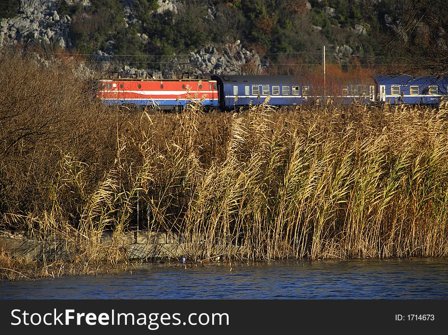 Train behind the skadar lake in the morning. Train behind the skadar lake in the morning