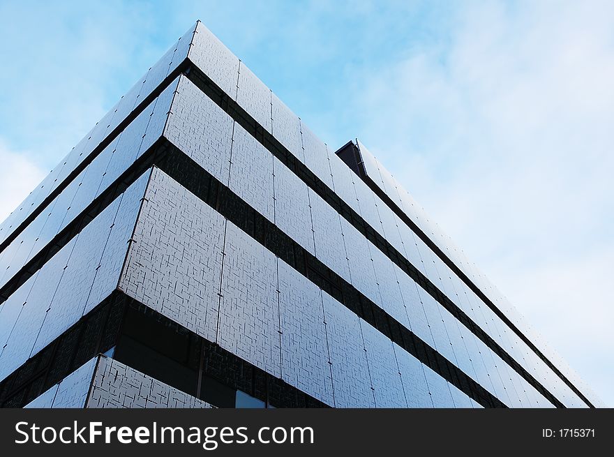 Office building wall with cloud reflection
