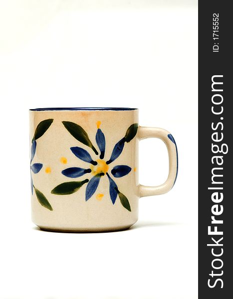 One nice floral design on a porcelain mug. One nice floral design on a porcelain mug.