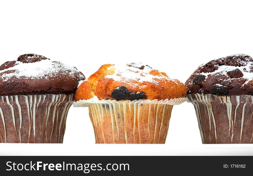 Chocolate muffins against a white background