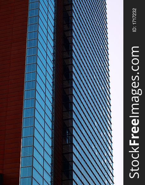 Tall office building with reflective windows. Tall office building with reflective windows