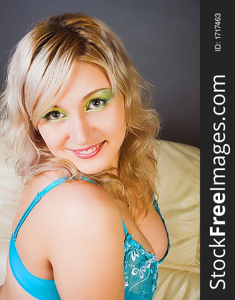 Beautiful young woman with magic green  eyes smiling