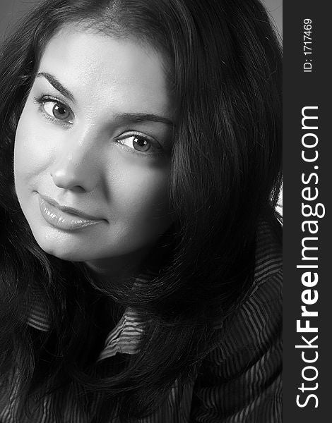 Closeup portrait of friendly brunette woman