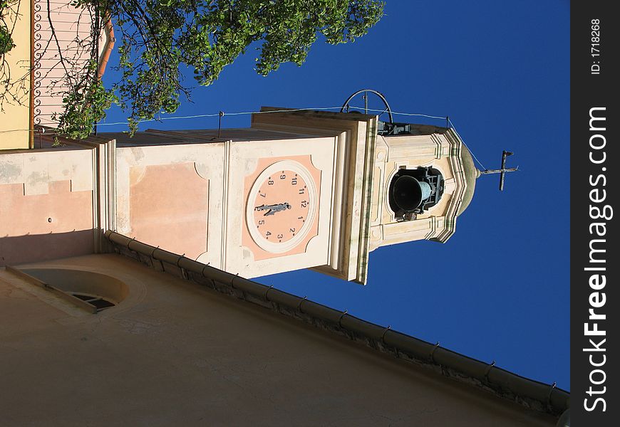 View of the bell tower of the village of Pieve Ligure. View of the bell tower of the village of Pieve Ligure