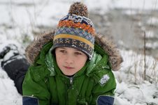 The Boy Lies On Snow Stock Photo The Boy Lies On Snow Stock Photo