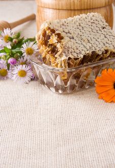 Honey, Honeycomb In Pot, Stick And Flowers On Sack Stock Images Honey, Honeycomb In Pot, Stick And Flowers On Sack Stock Images