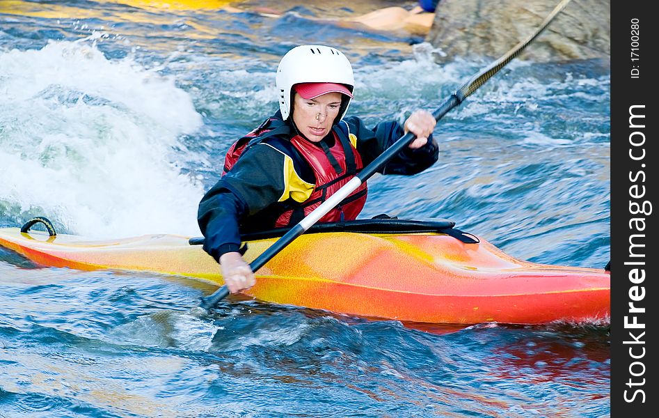 A shot of the kayaker on the rough water