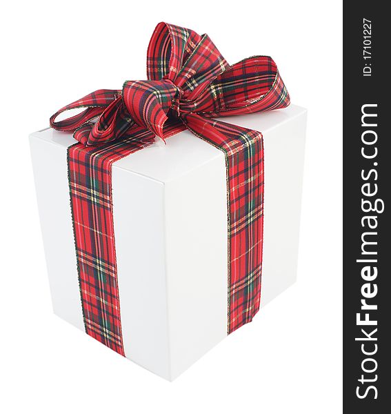 White gift box with a red bow on white background