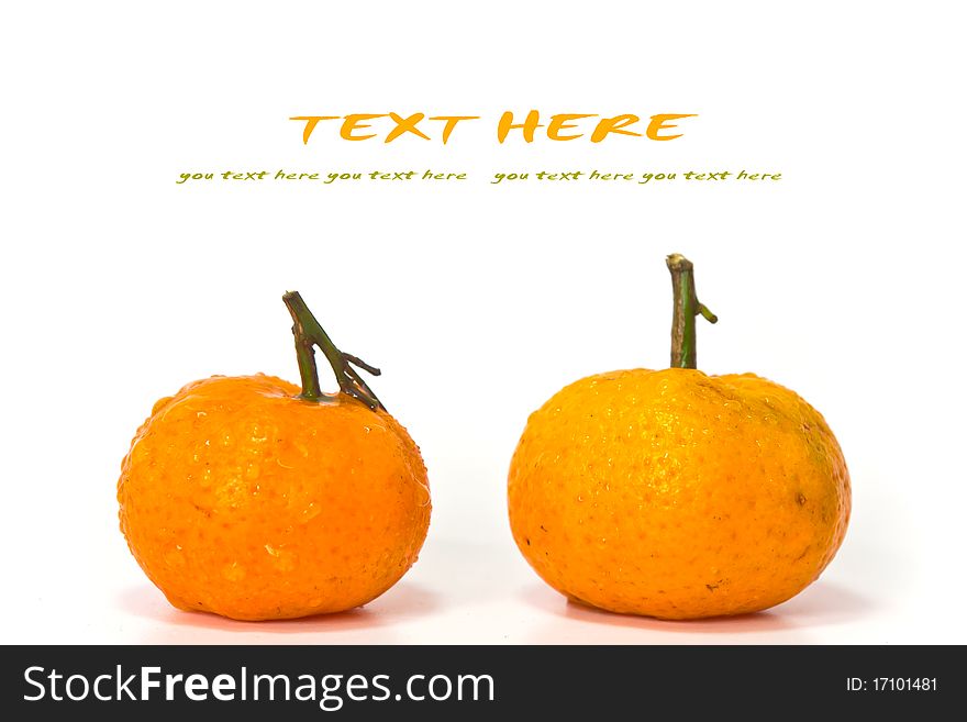 Oranges on white background with copy-space.