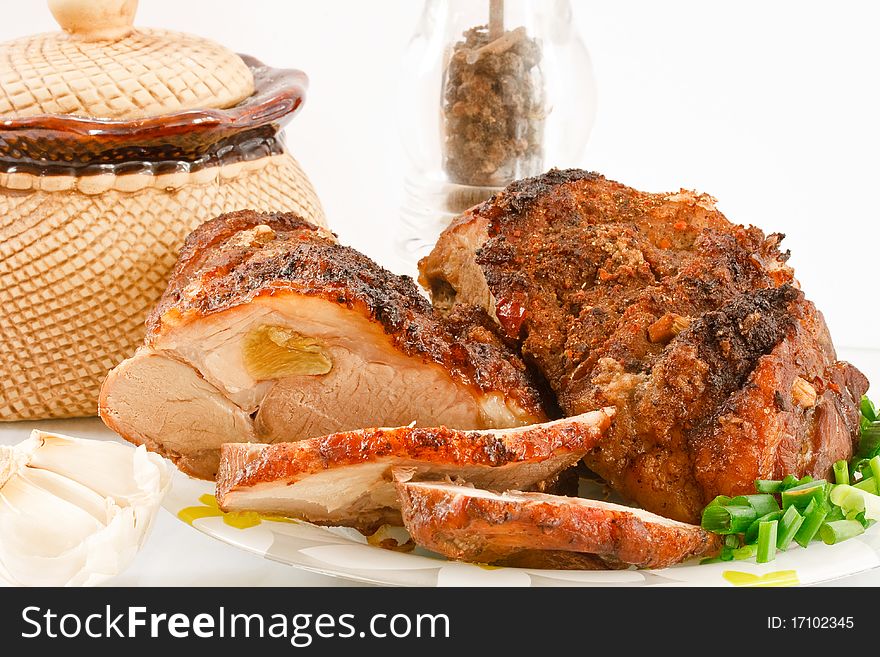 Roasted meat on a plate with spices. Roasted meat on a plate with spices