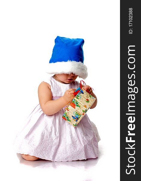 Beautiful Baby In Santa S Hat With A Present