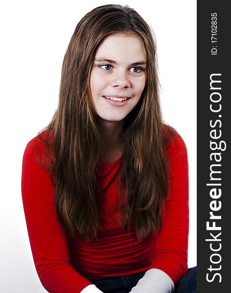 Smiling teenage girl in studio