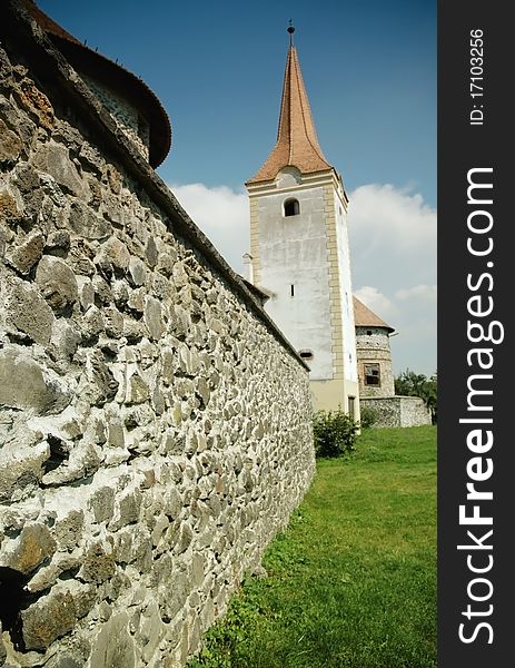 Fortified church with defense wall. Racos (Alsorakos), Transylvania, Romania. Fortified church with defense wall. Racos (Alsorakos), Transylvania, Romania