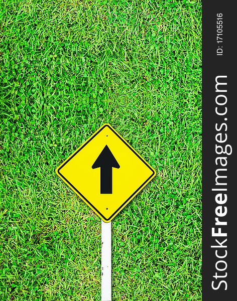 Go ahead traffic sign on grass field