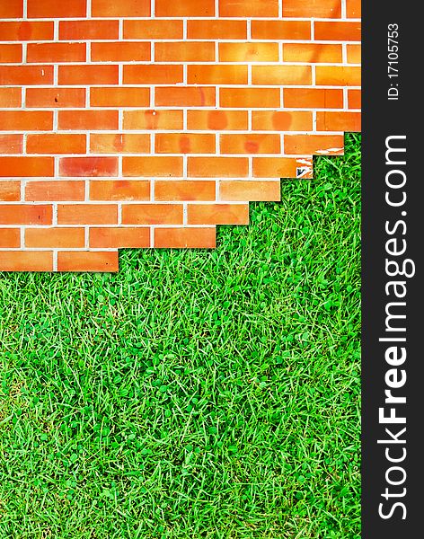 Brick Wall Fence And Grass Field