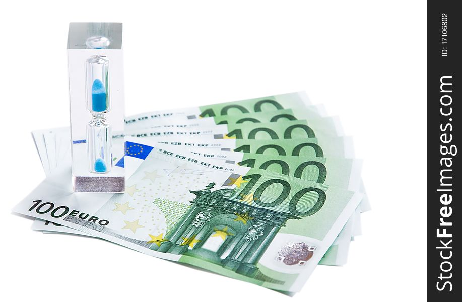 Hourglass stand on the euro banknotes. Hourglass stand on the euro banknotes