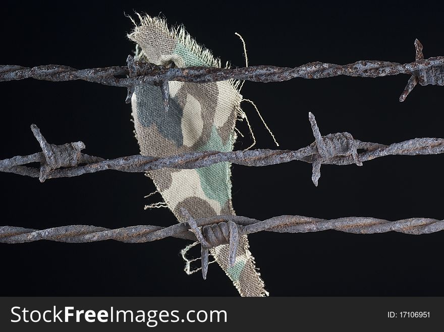 Three rusty barbed wire on black background