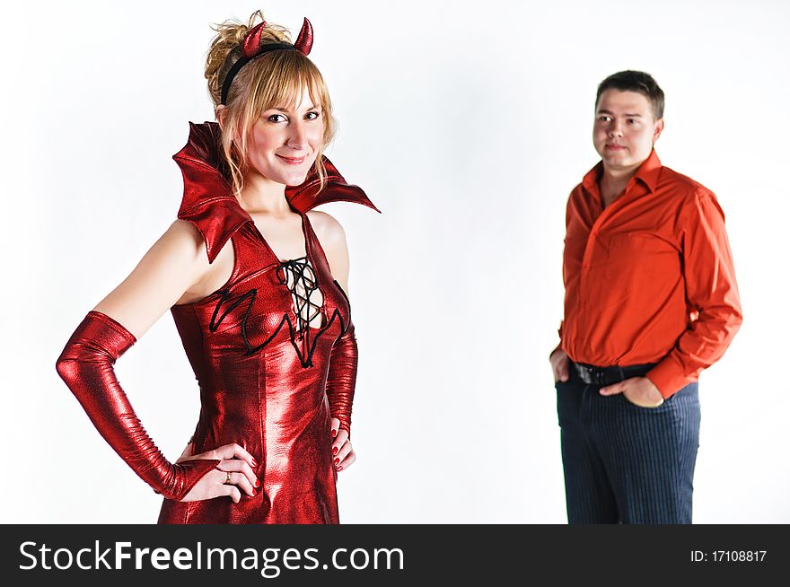 Red devil couple on white background