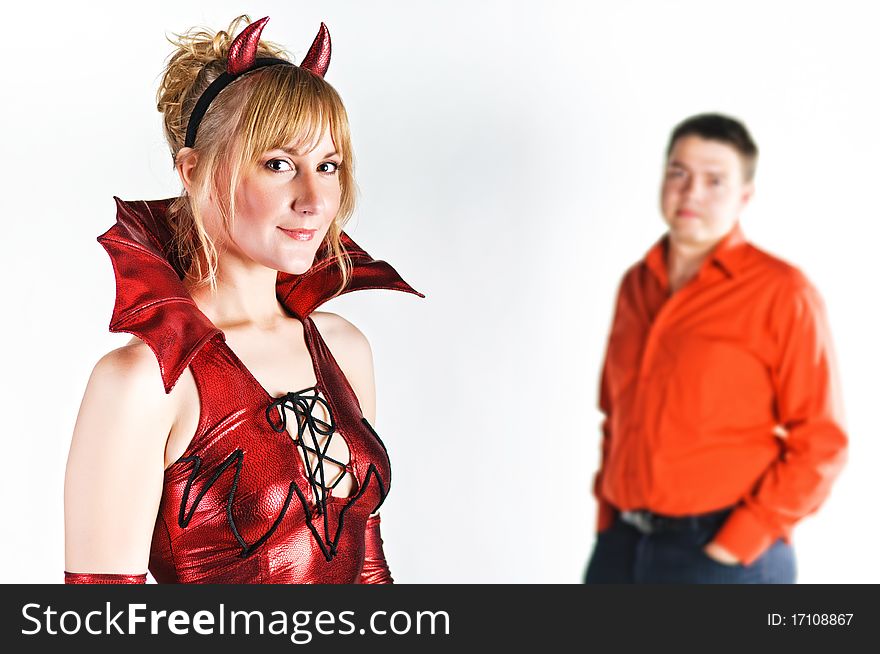 Red devil couple on white background