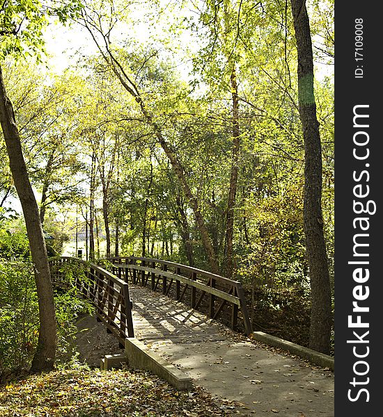 Rustic Foot Bridge In Autumn