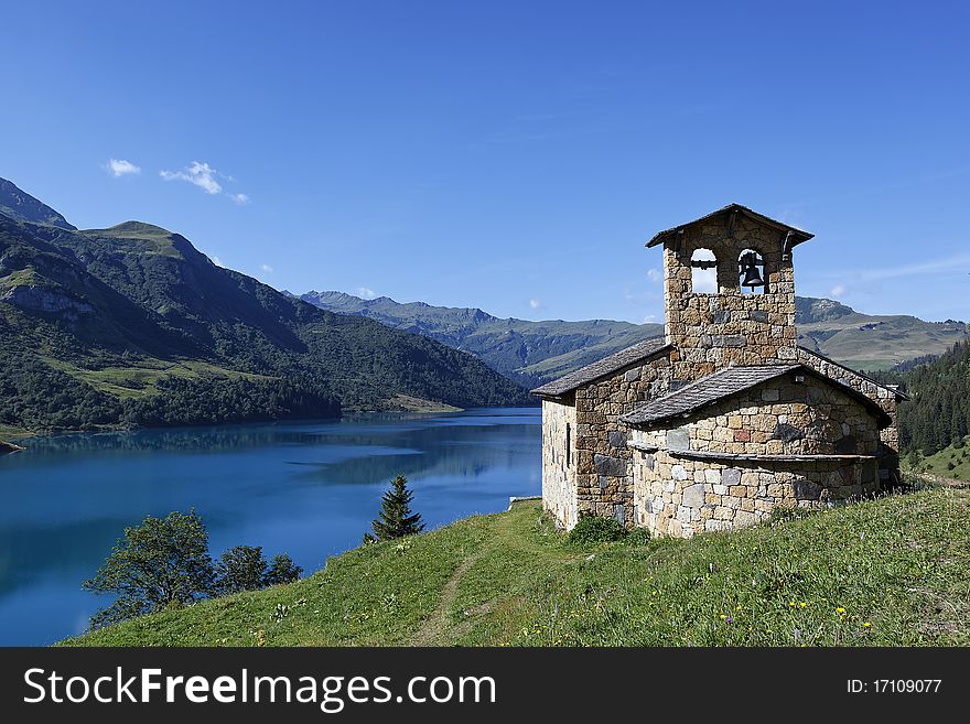 Chapel and lake in french mountain. Chapel and lake in french mountain