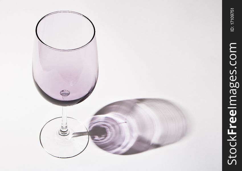 Light claret wineglass with shadow. Light claret wineglass with shadow