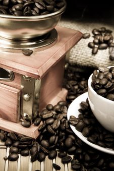 Coffee, Beans And Grinder On Sacking In Night Time Stock Photography