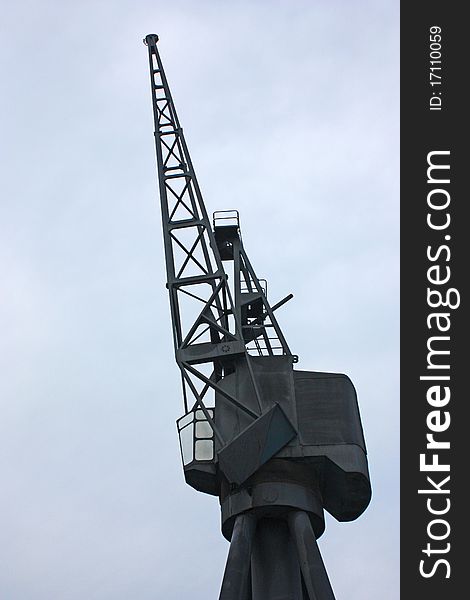 A View of a Traditional Dockside Crane from the Side.