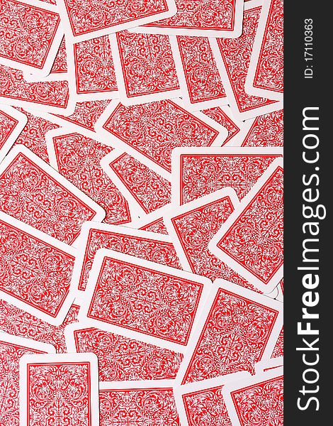 Scattered playing cards background on playing table