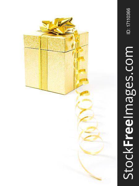 Christmas golden gift-box on white background, with golden ribbon