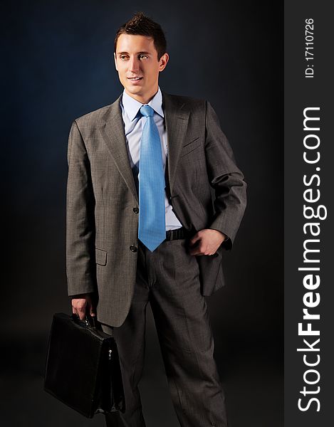 Young businessman with a portfolio