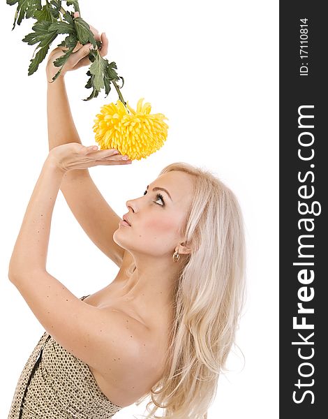 sweet girl with a beautiful yellow flower in the hands of. sweet girl with a beautiful yellow flower in the hands of