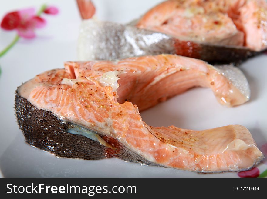 Pieces of sea fish on the plate