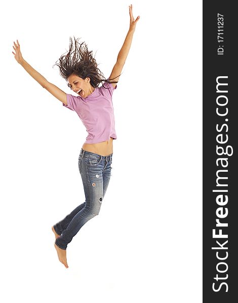 Cute Young Woman With Jeans Jumping