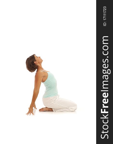 Young woman doing yoga exercises