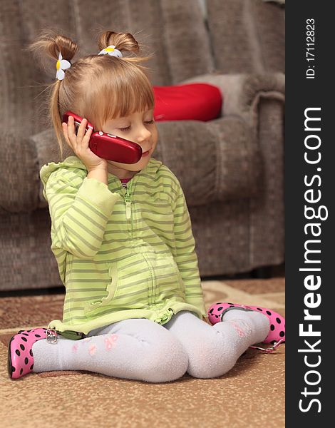 Charming Little Girl Talking On The Phone