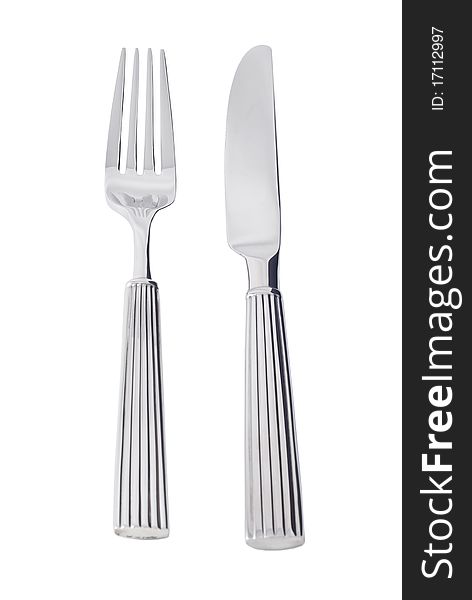 Cutlery lying on a white background