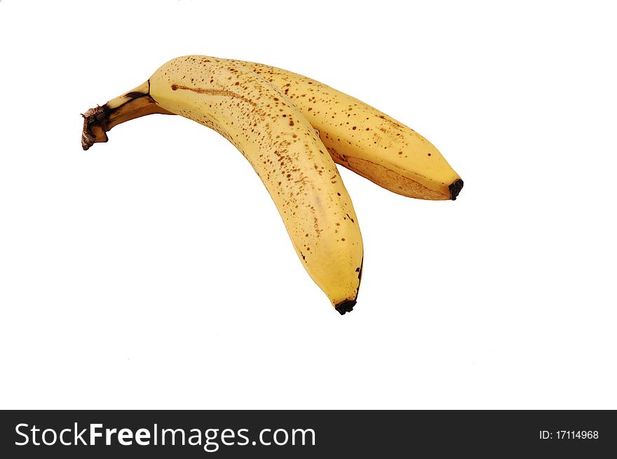 Two ripe bananas on white background with copy space. Two ripe bananas on white background with copy space.